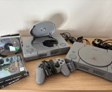 Repair/parts: x2 PlayStation consoles, Dual Shock controller, game cases