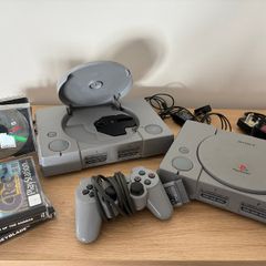 Repair/parts: x2 PlayStation consoles, Dual Shock controller, game cases