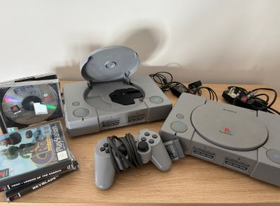 Repair/parts: x2 PlayStation consoles, Dual Shock controller, game cases