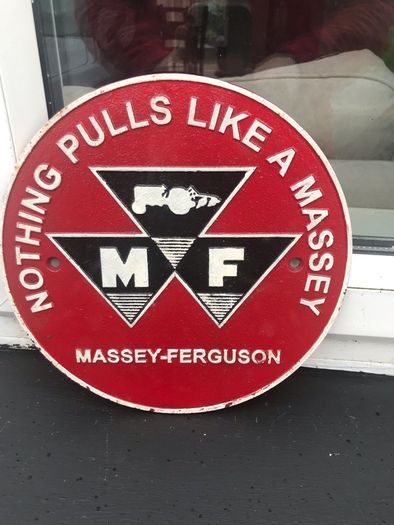 Nothing pulls like a Massey cast iron sign