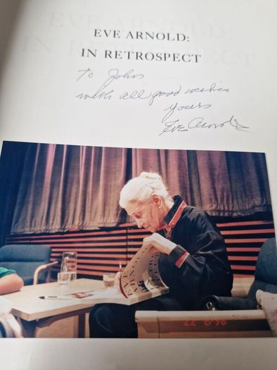 eve arnold retrospective, signed copy with enclosed photo of artist