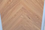 All new laminated herringbone flooring available for delivery