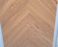 All new laminated herringbone flooring available for delivery