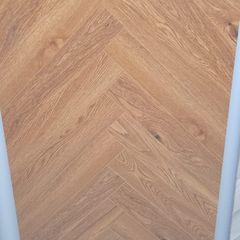 All new laminated herringbone flooring available for delivery