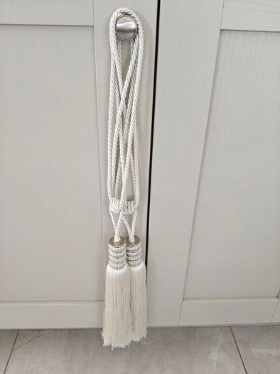 Cream curtains and matching tie backs