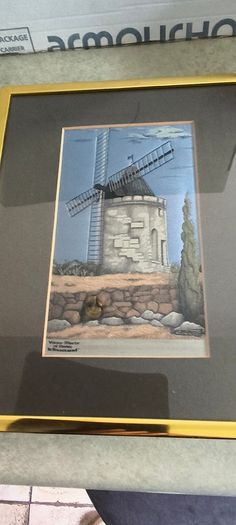 Is 3 pictuer Framed Le Tisserand Jacquard woven silk picture featuring a windmill 30.00 euro , old photo from Charleville, Co. Cork 18 euro, framed Holy post card  Pieta , Love and Honor Jesus 12 euro..