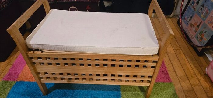 Wooden bench with storage.