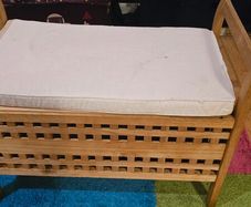 Wooden bench with storage.