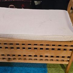 Wooden bench with storage.
