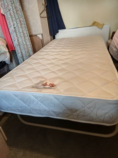 Single bed with pullout bed underneath
