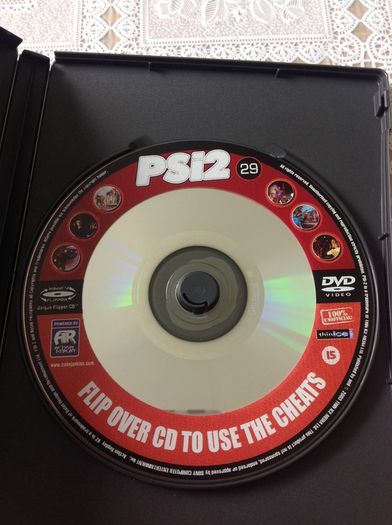 2 PS2 Cheat Discs.