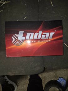 Loader wireless remote and hydraulic body lock