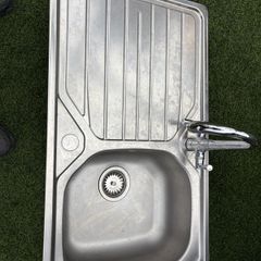 kitchen sink with tap