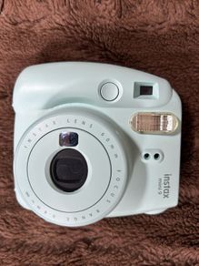 Fujifilm Instax Mini 9 Polaroid camera with accessories