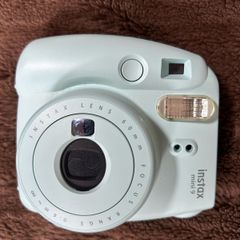 Fujifilm Instax Mini 9 Polaroid camera with accessories