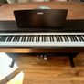 Yamaha Arius YDP-142 Digital Piano with rosewood finish and matching stool Image 5