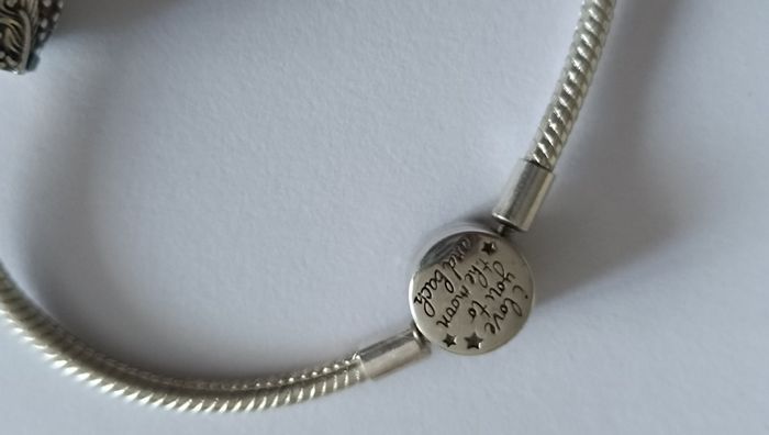 Pandora charm bracelet with assorted charms