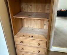 Solid pine shelving unit with three drawers