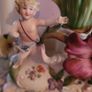 19th century pair of handpainted floral cherub porcelain candleholder/budvases Image 4