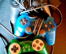 3 playstation 1 & 2 controllers