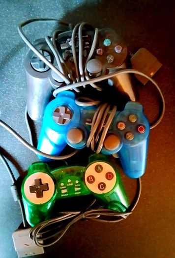3 playstation 1 & 2 controllers