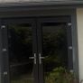 Two anthracite (grey) uPVC doors and one window Image 2