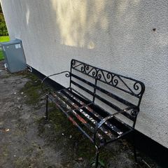Vintage style black metal garden bench