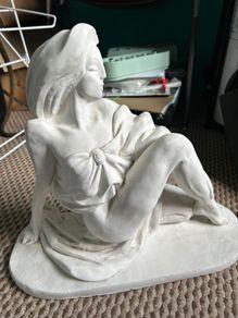 Lady on Rock Statue