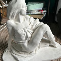 Lady on Rock Statue
