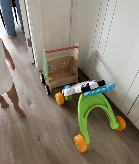 Two baby walkers - Fisher-Price Zebra and wooden activity walker