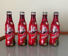 5 Vintage Coca Cola bottles