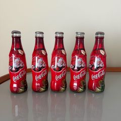 5 Vintage Coca Cola bottles