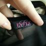 Evita brand Black Dress with Cream Design Peplum Image 3