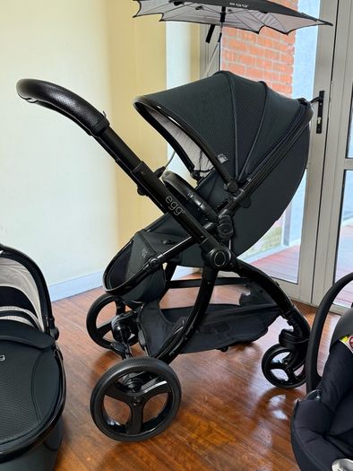 As New Egg2 travel system with Cybex car seat and isofix base swivel