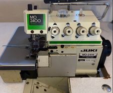 Juki MO 2414 rolled hem industrial overlocker machine