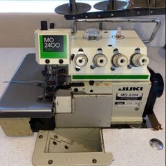 Juki MO 2414 rolled hem industrial overlocker machine