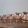Stunning Set of 5 Vintage/Antique Copper Haystack Measuring Jugs Full Graduated Set Image 2