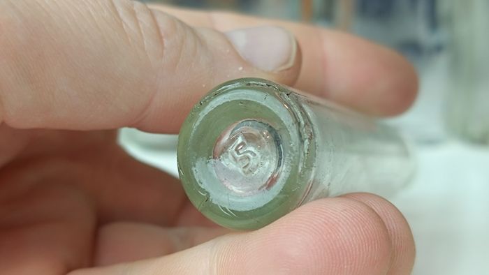492 - Set of 7 Vintage Clear Glass Screw Cork Top Collectible Decorative Bottles