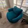 Teal love seat swivel. Image 2