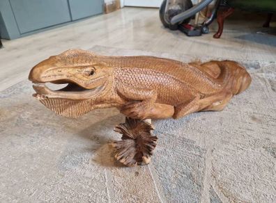Carved wooden iguana