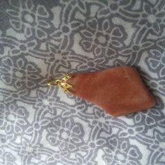 Necklace charm very nice and dressy .