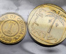 2 Uncirculated Coins Israel and Guyana