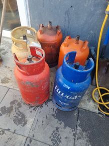 gas bottles  almost full  20 a bottle