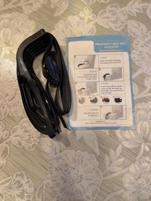 Pregnancy seat belt adjuster