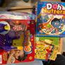 Kids table and chairs and mix of toys and books all have to go together Image 3