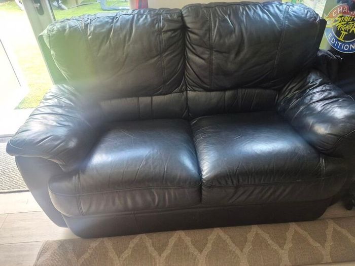 Free black leather 2 seater couch