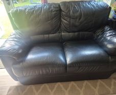 Free black leather 2 seater couch