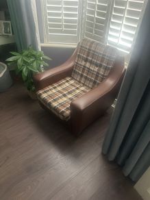 Vintage 1970s armchair on castors.