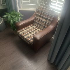 Vintage 1970s armchair on castors.