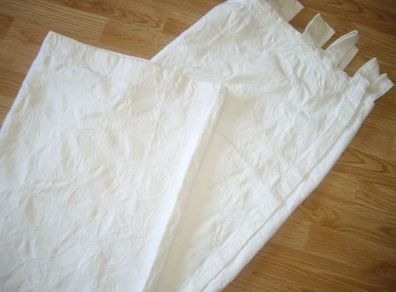 White  curtains with print on.